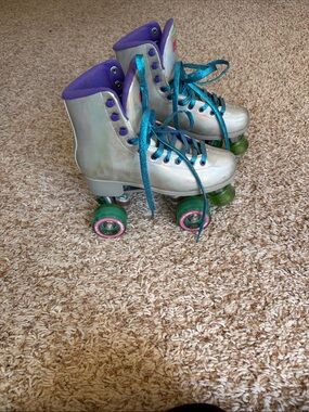 Kids Iridescent Roller Skates with Purple Lining and Teal Laces